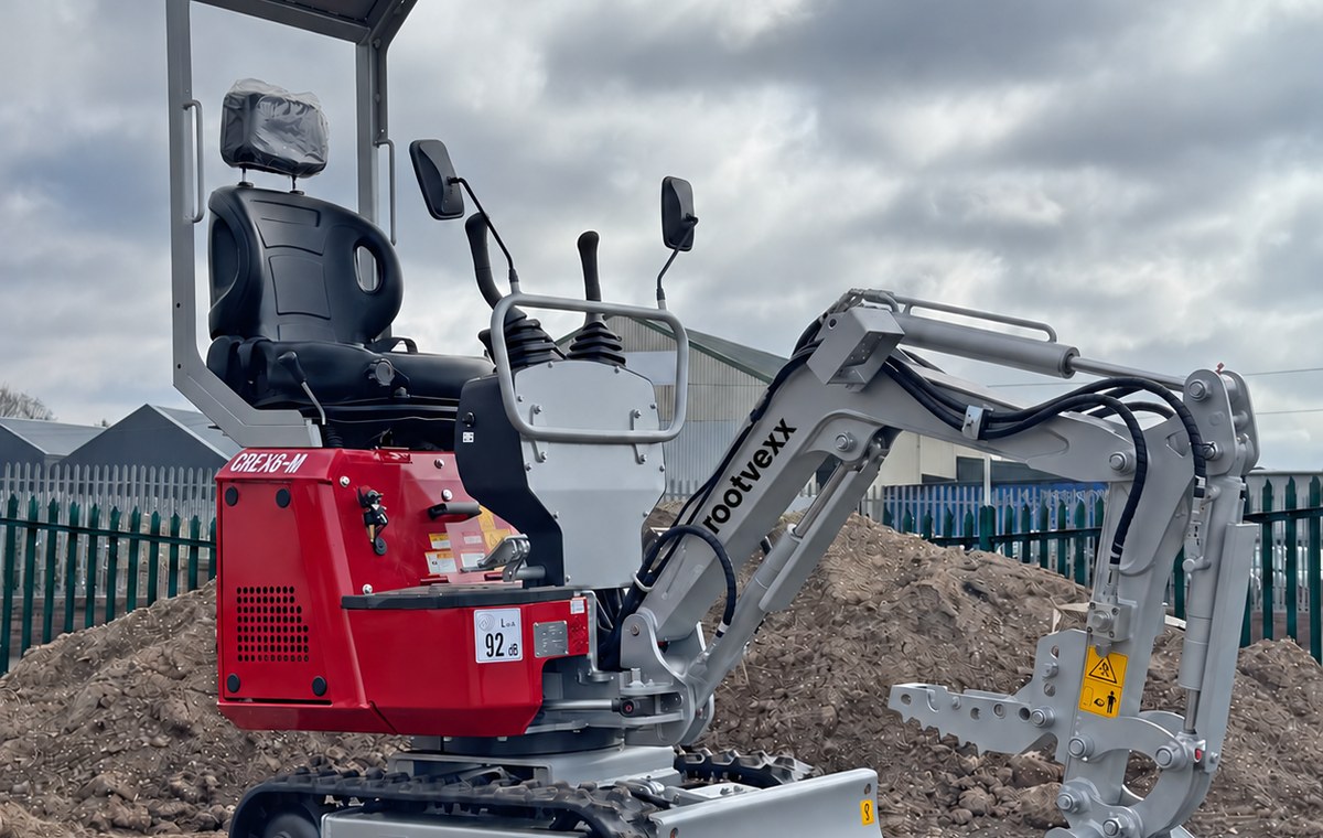 CREX6-M mini excavator, full machine on site with the canopy up and the blade down