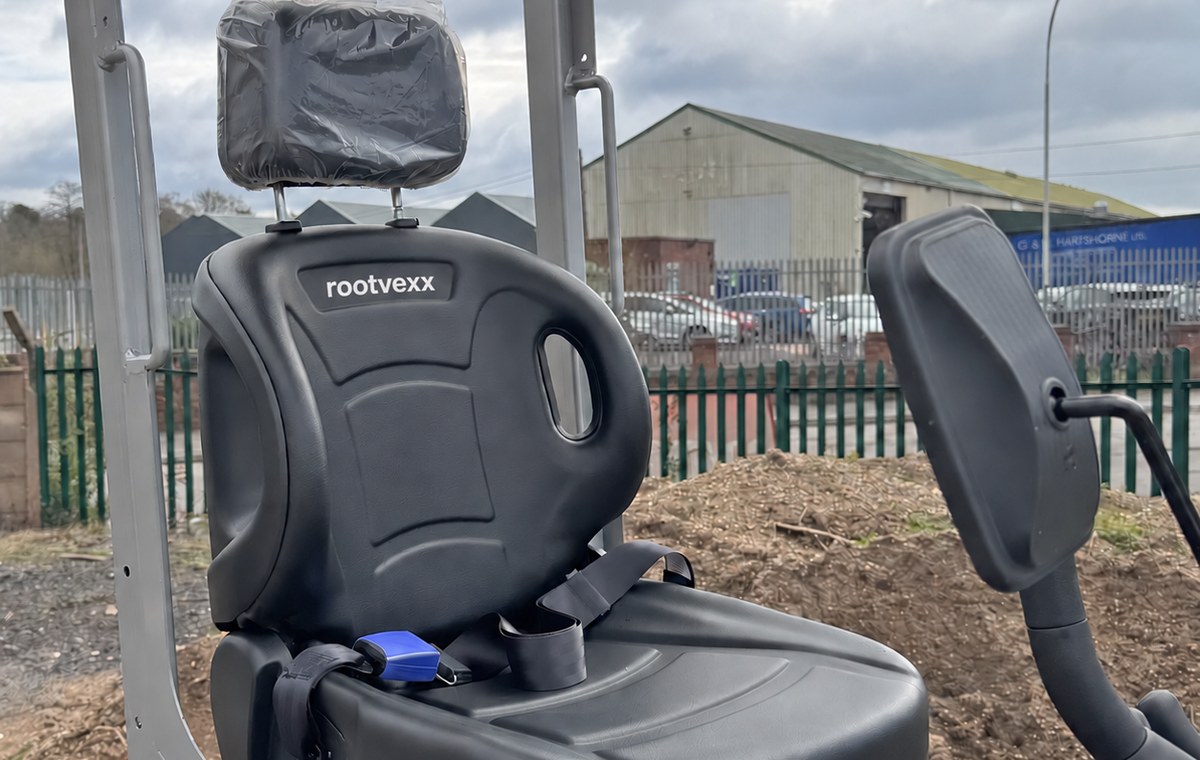 CREX6-M mini excavator, belted suspension seat under the ROPS canopy