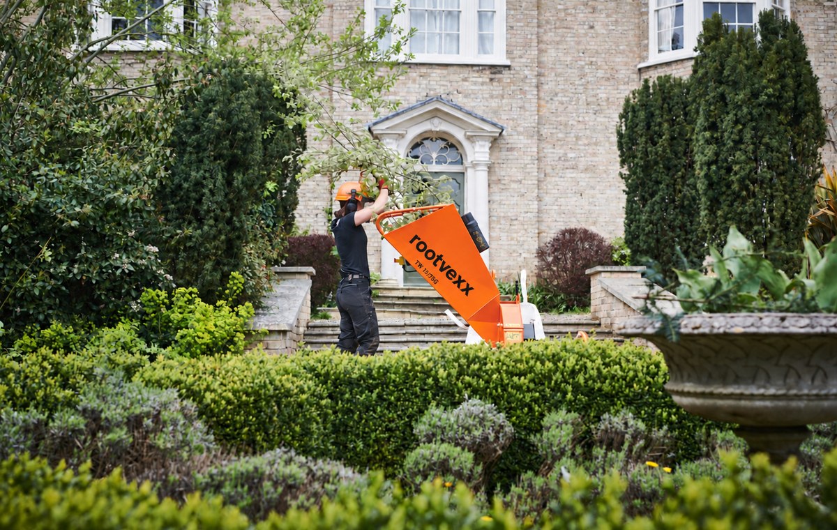 TW 13/75G petrol wood chipper, in use on a landscaping job